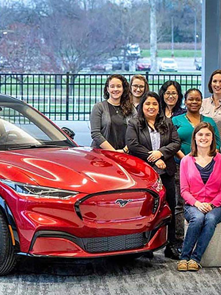 Group of women with car