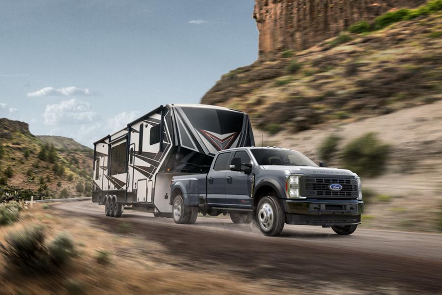 2025 Ford Super Duty® F-450® DRW Limited pickup pulling a large camper