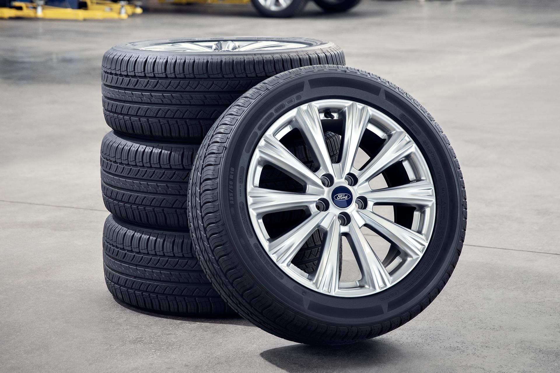 A stack of new tires at the Ford Service shop