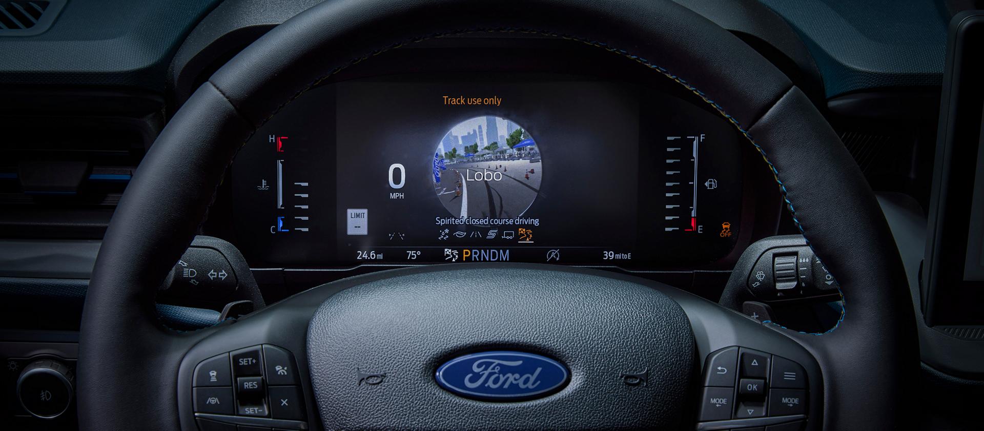 Close-up of the digital instrument cluster highlighting the drive modes