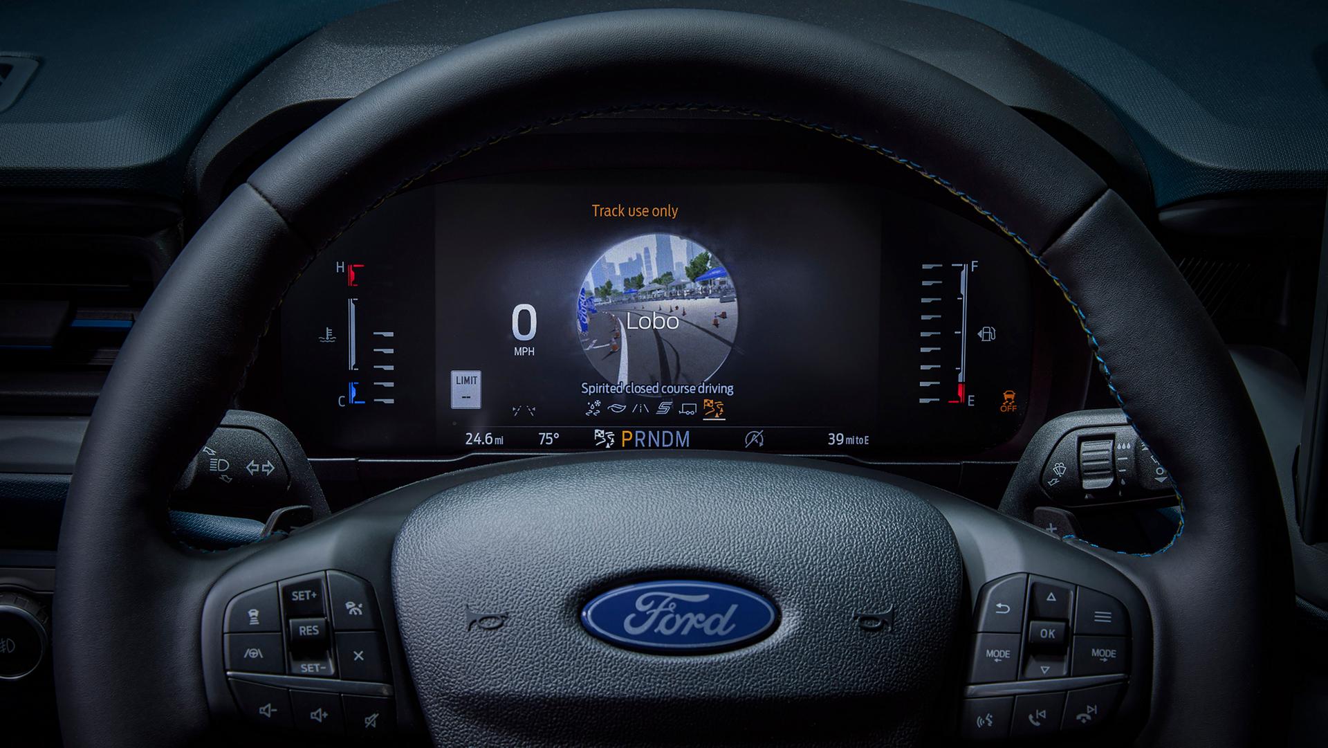 Close-up of the digital instrument cluster highlighting the drive modes