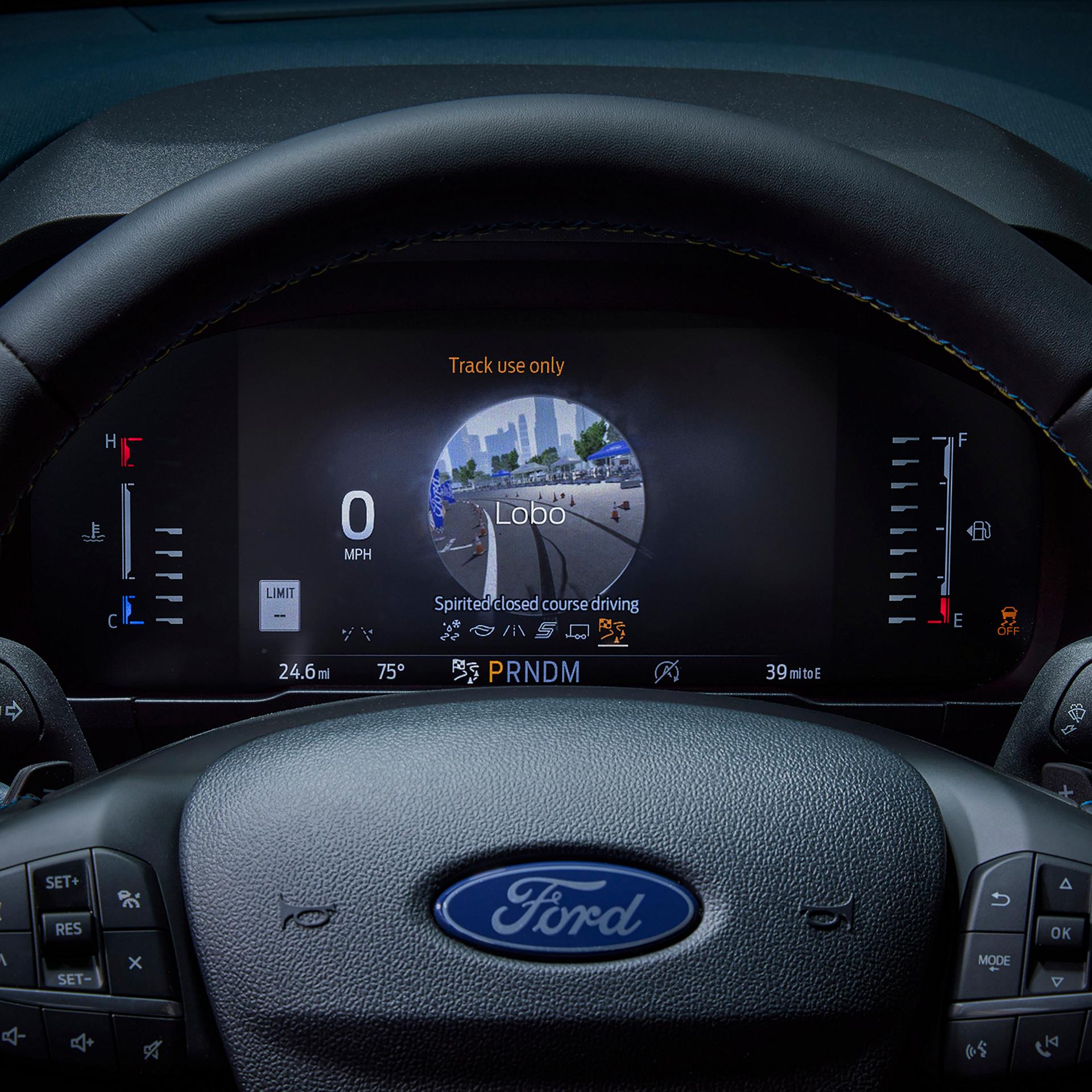 Close-up of the digital instrument cluster highlighting the drive modes