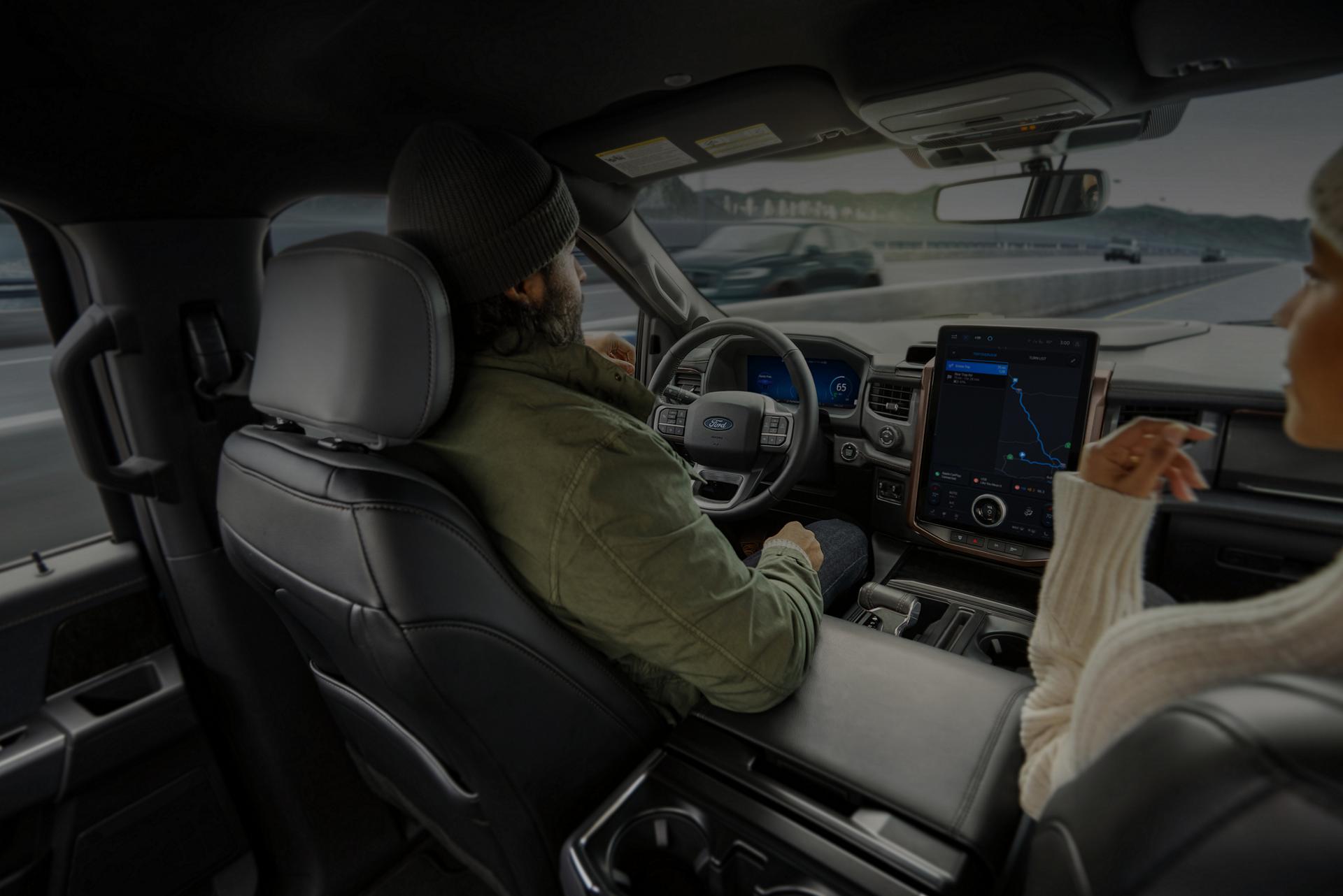 Interior of a Ford F-150® Lightning® truck with a large display