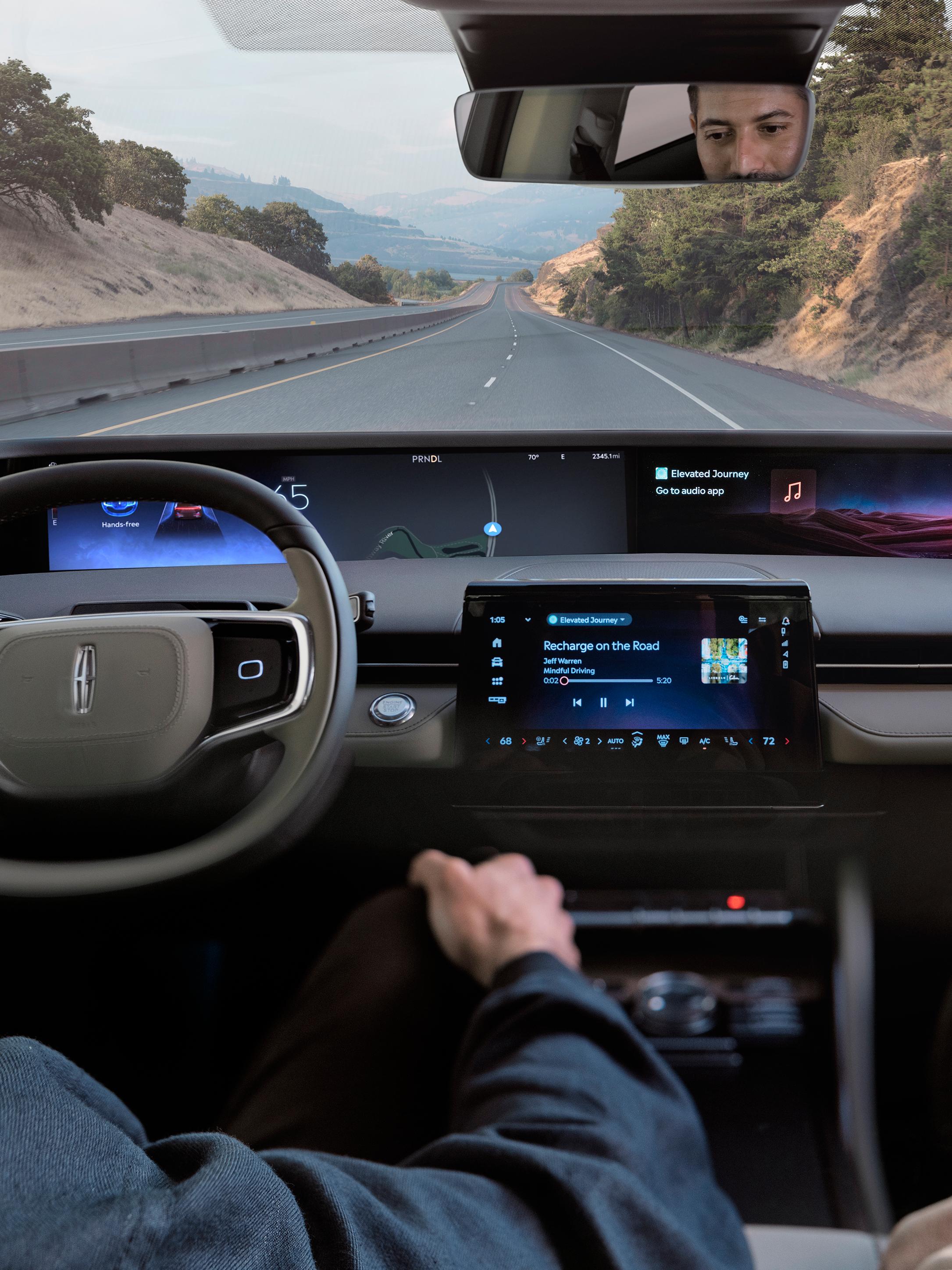 A driver of a Lincoln SUV enjoys hands-free highway driving courtesy of Lincoln BlueCruise