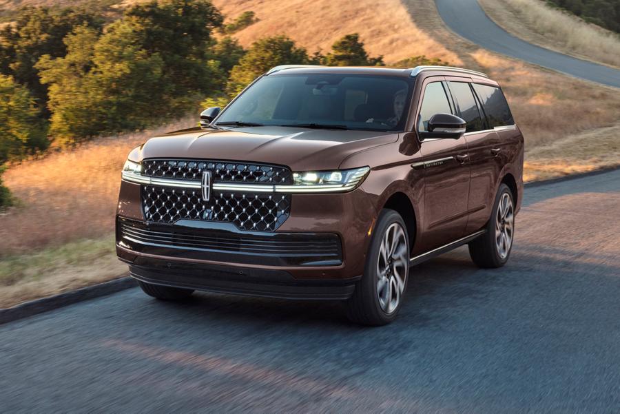 The 2027 Lincoln Navigator driving down the road