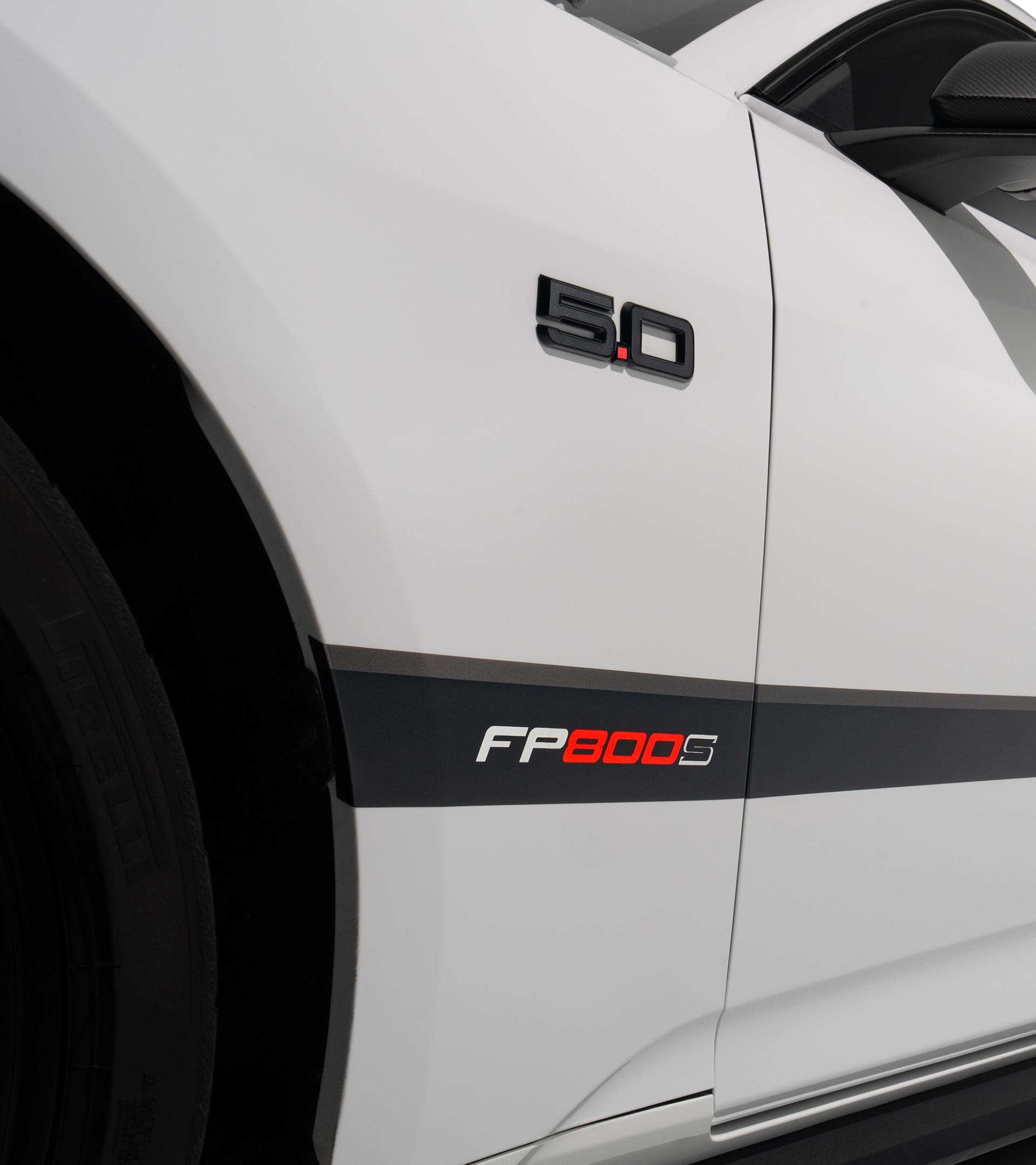 Bodyside detail of the FP800S black graphics stripe on the white Mustang