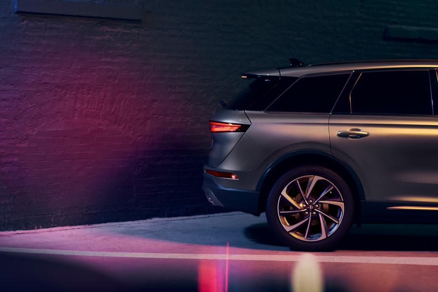 A 2025 Lincoln Corsair uses Reverse Brake Assist as it backs up towards a wall