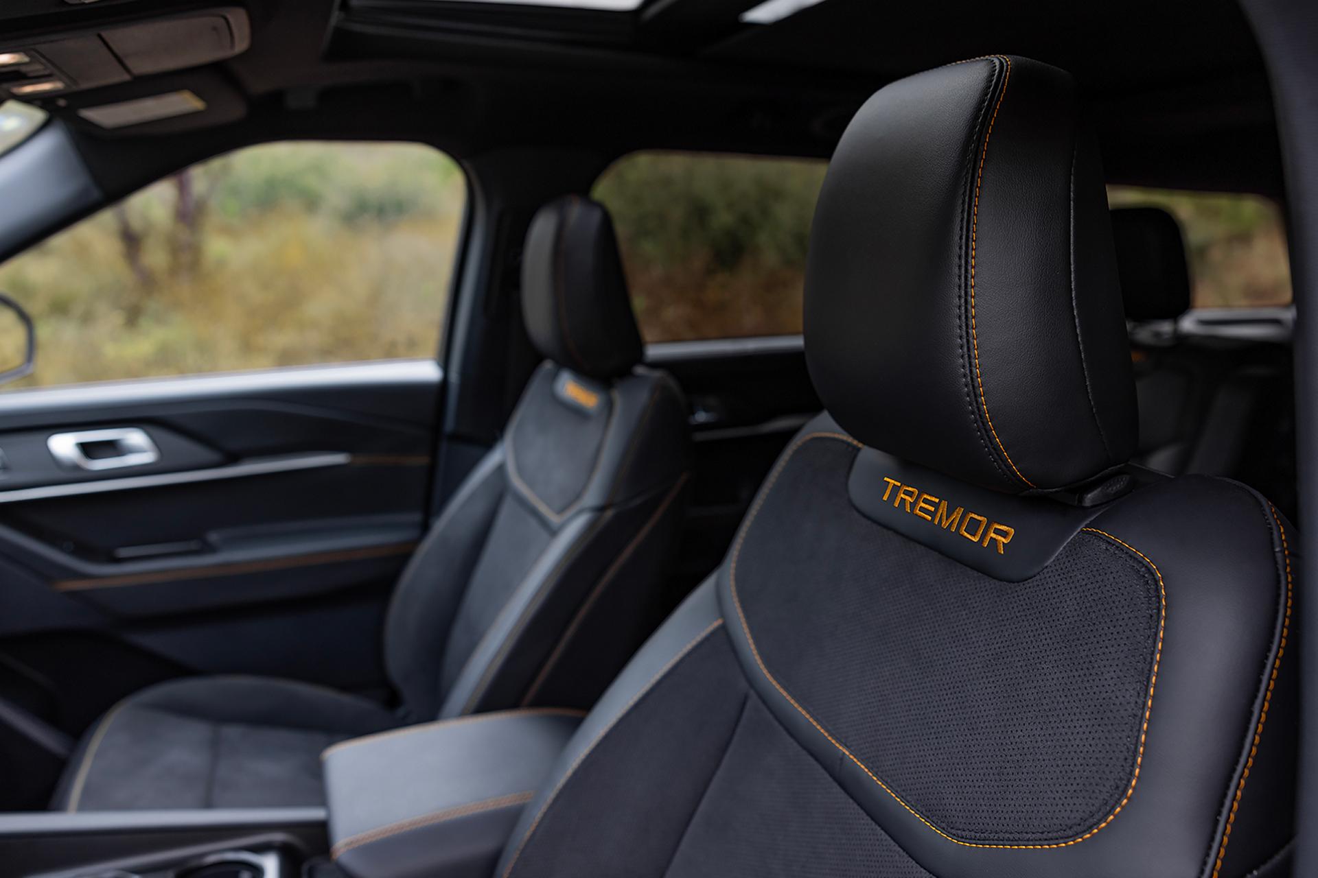 A close-up of the seats on a 2027 Ford Explorer® Tremor® SUV, showing the Tremor logo stitching