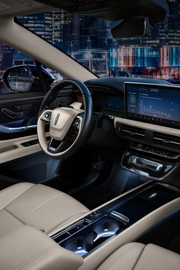 The interior of a 2026 Lincoln Corsair is shown in the Light Smoked Truffle interior colour