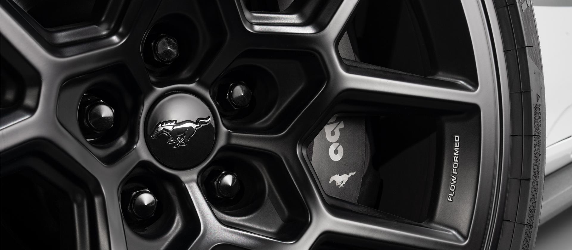 Close-up of the black R1 wheel spokes with the black lug nut kit
