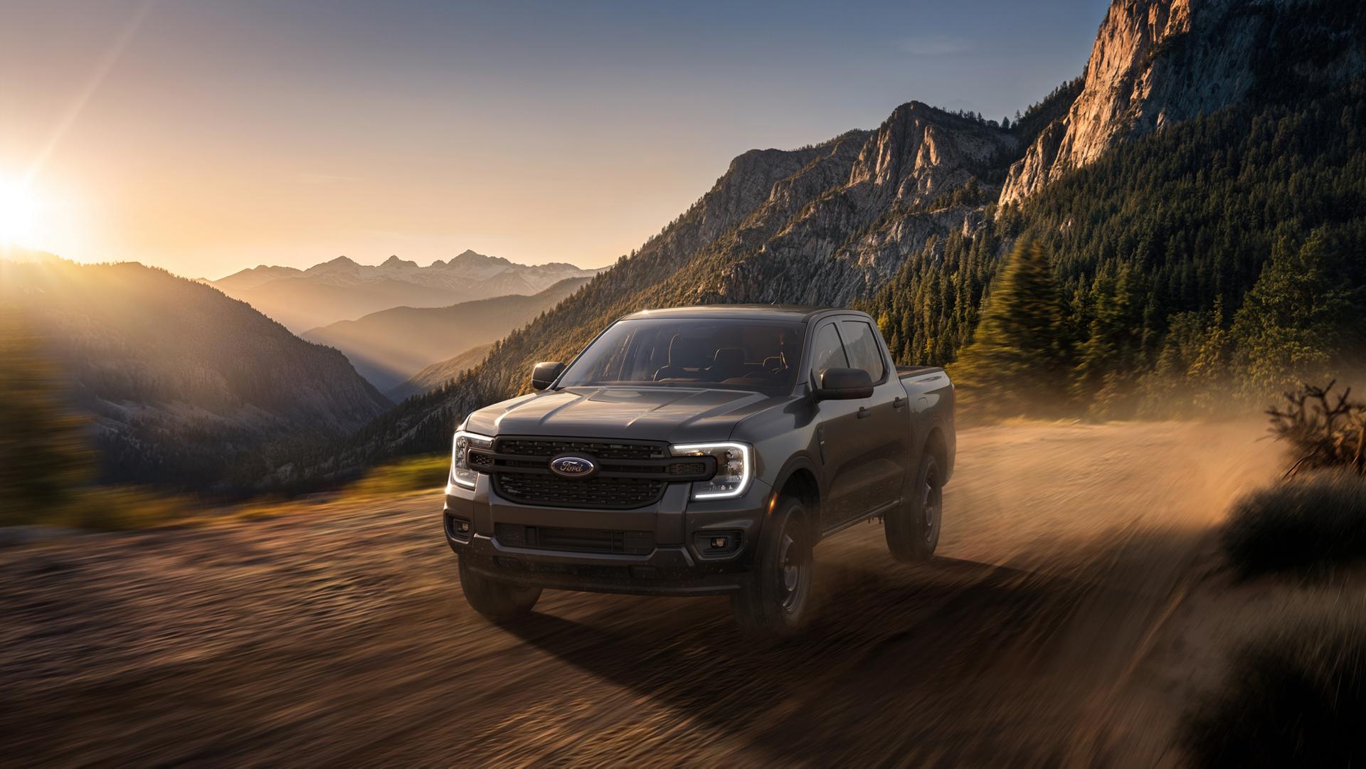 2026 Ford Ranger® XL model with the STX® Appearance Package being driven in the mountains at dusk