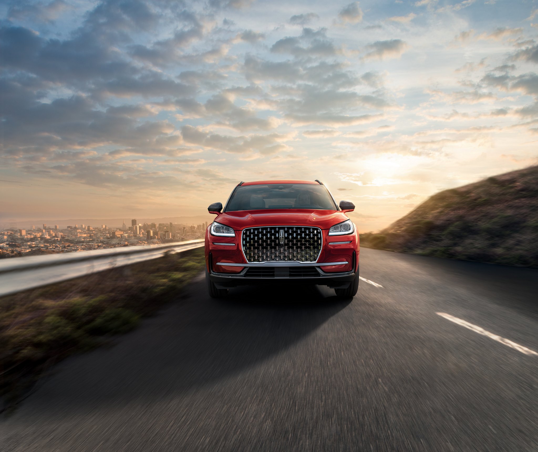 A 2025 Lincoln Corsair® Reserve model is being driven on a mountain road