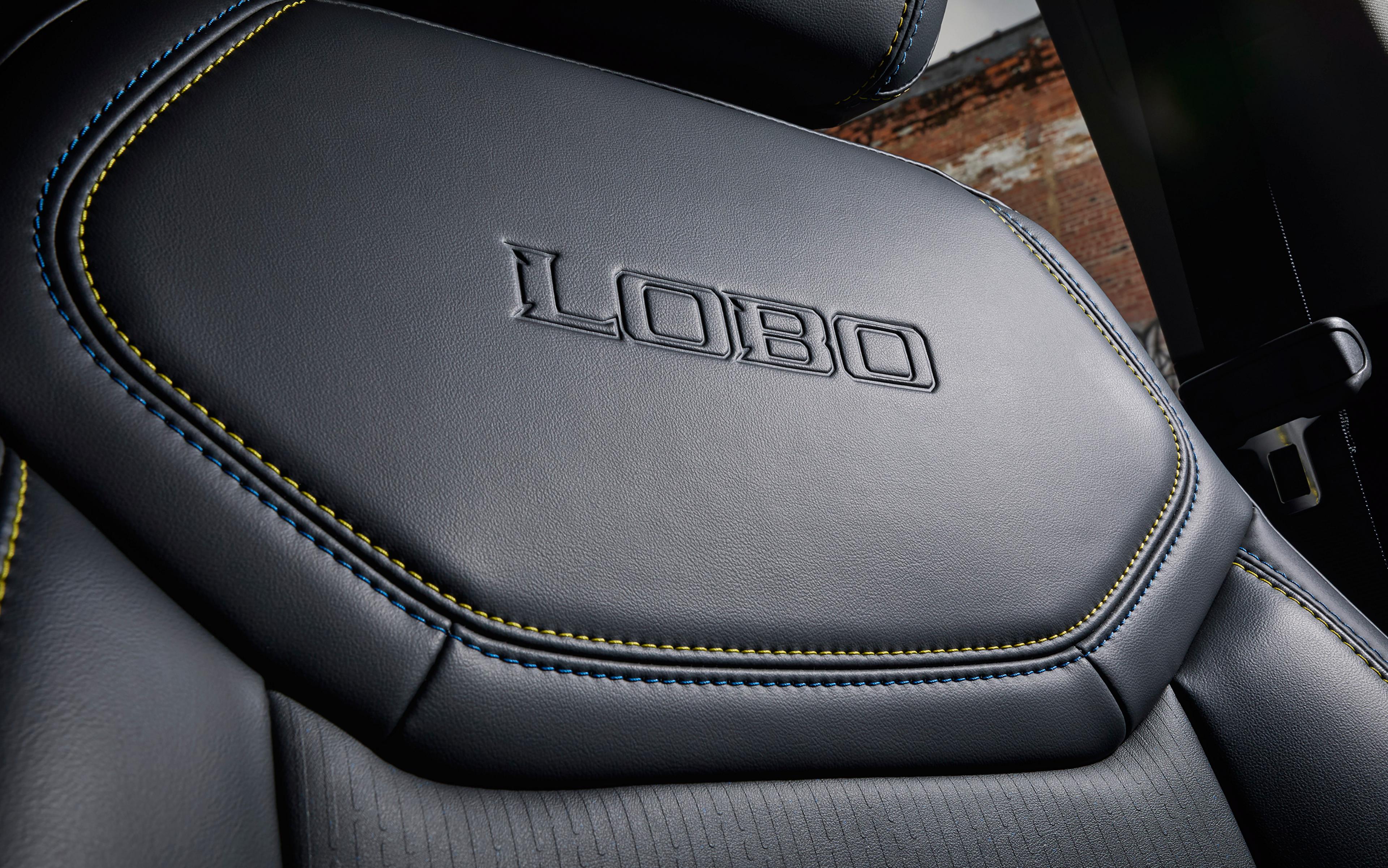 Close-up of a 2026 Ford Maverick Lobo™ seat back showing the embossed logo