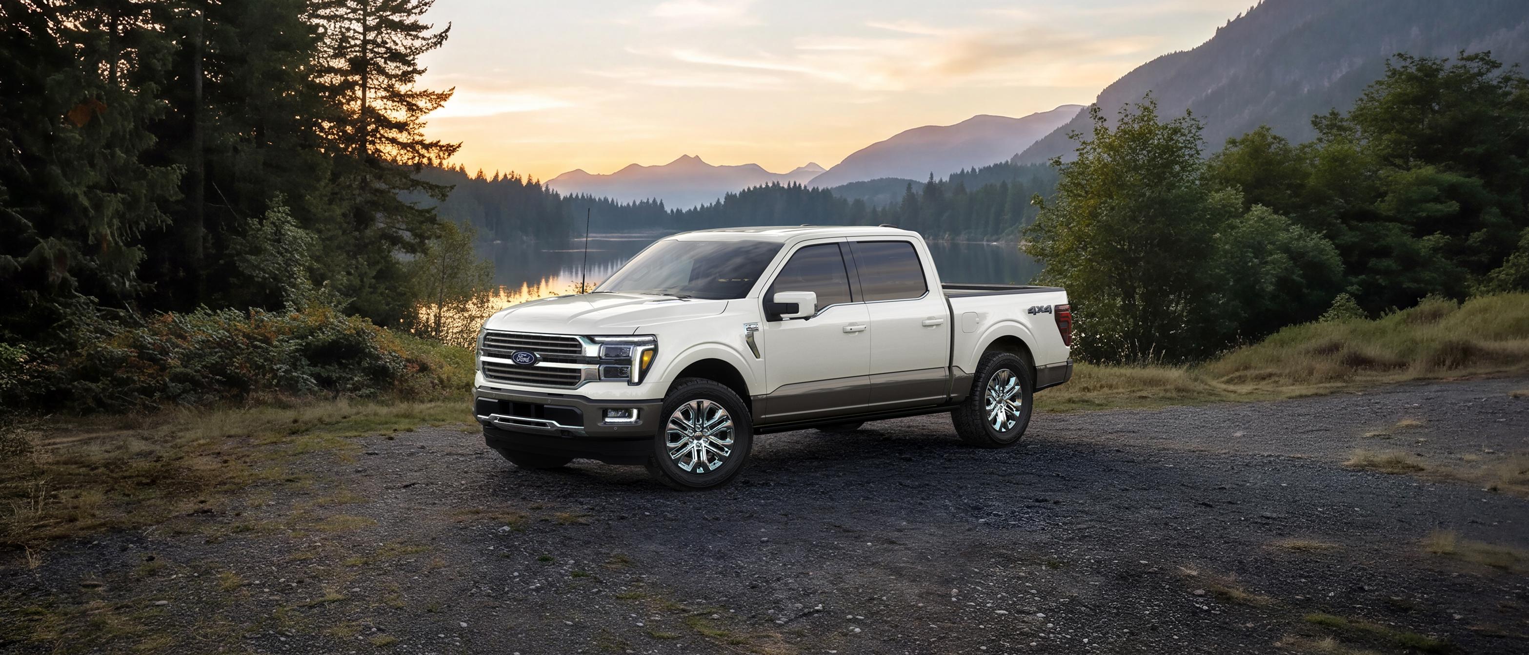 2027 Ford F-150® King Ranch® model parked near a mountain lake