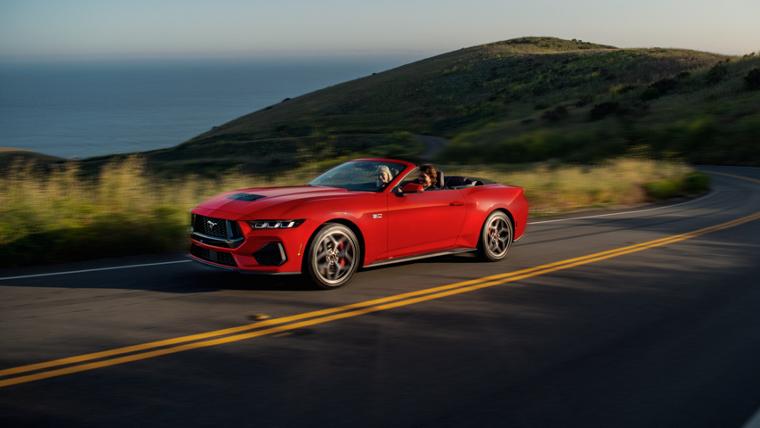 2025 Mustang® GT convertible being driven on a hill