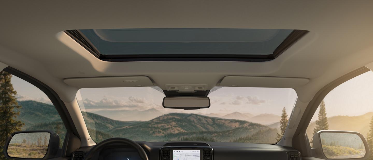Interior view of the windshield and moonroof inside the 2026 Ford Ranger® Lariat® model in the color Sandstone