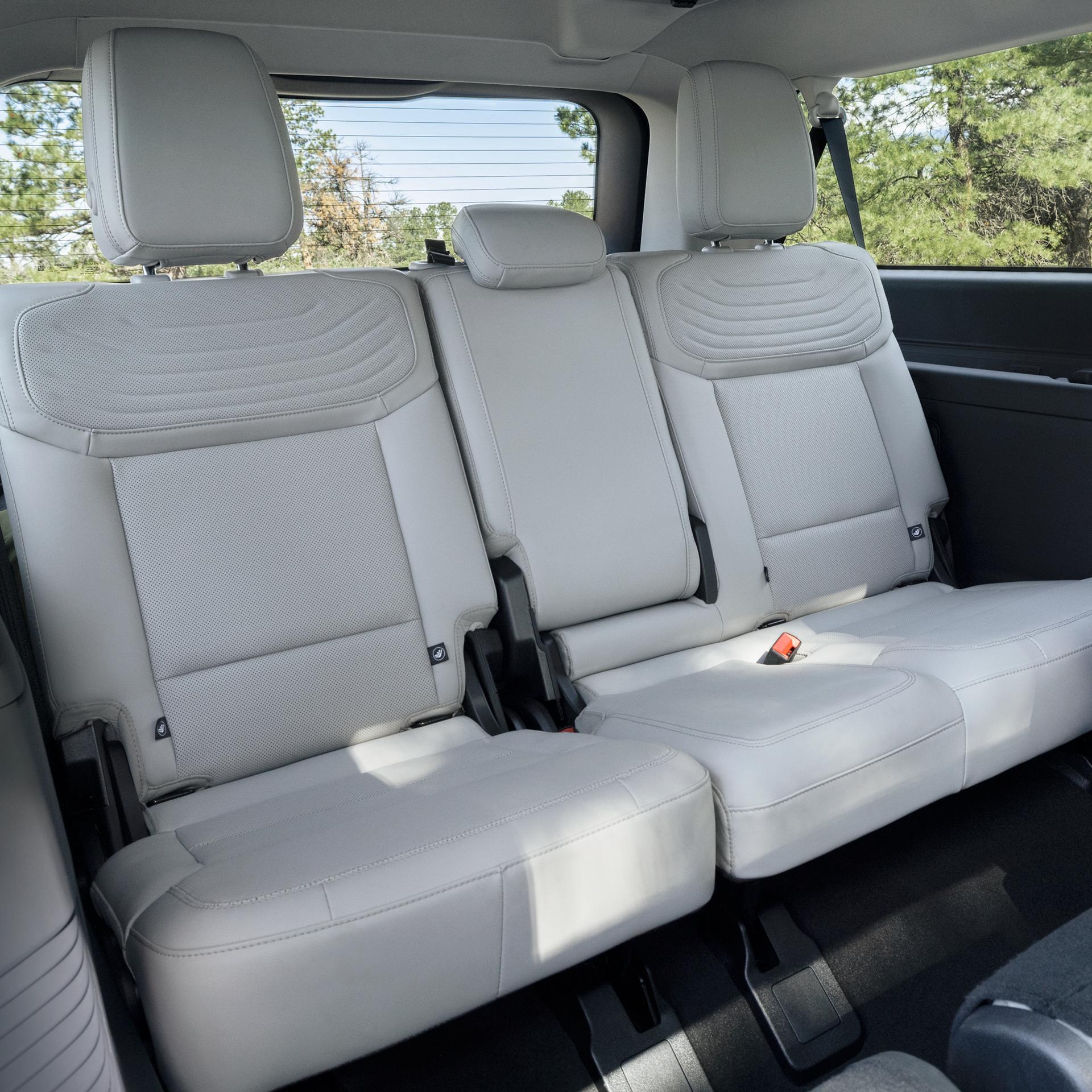 2026 Ford Expedition® Platinum® SUV rear seating area with a seat folded flat