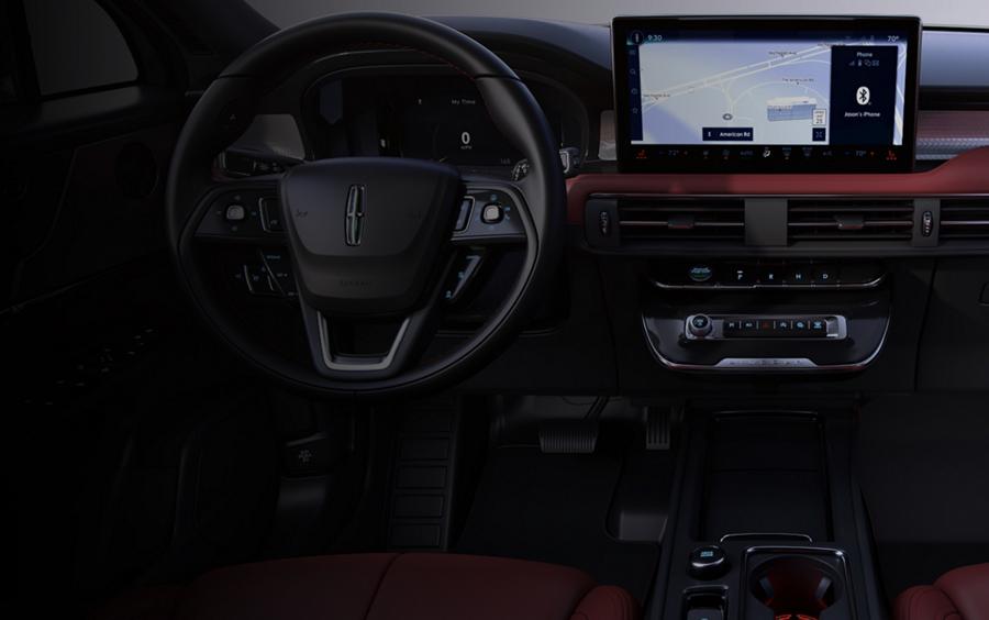 The front-row seating, steering wheel, and dash screen of a 2025 Lincoln Corsair®