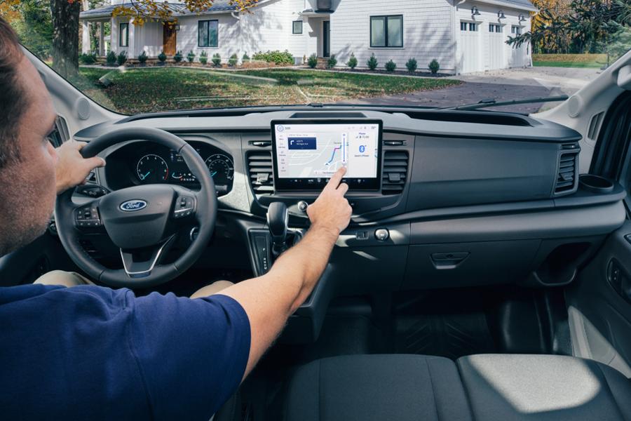 A man interacting with the touchscreen