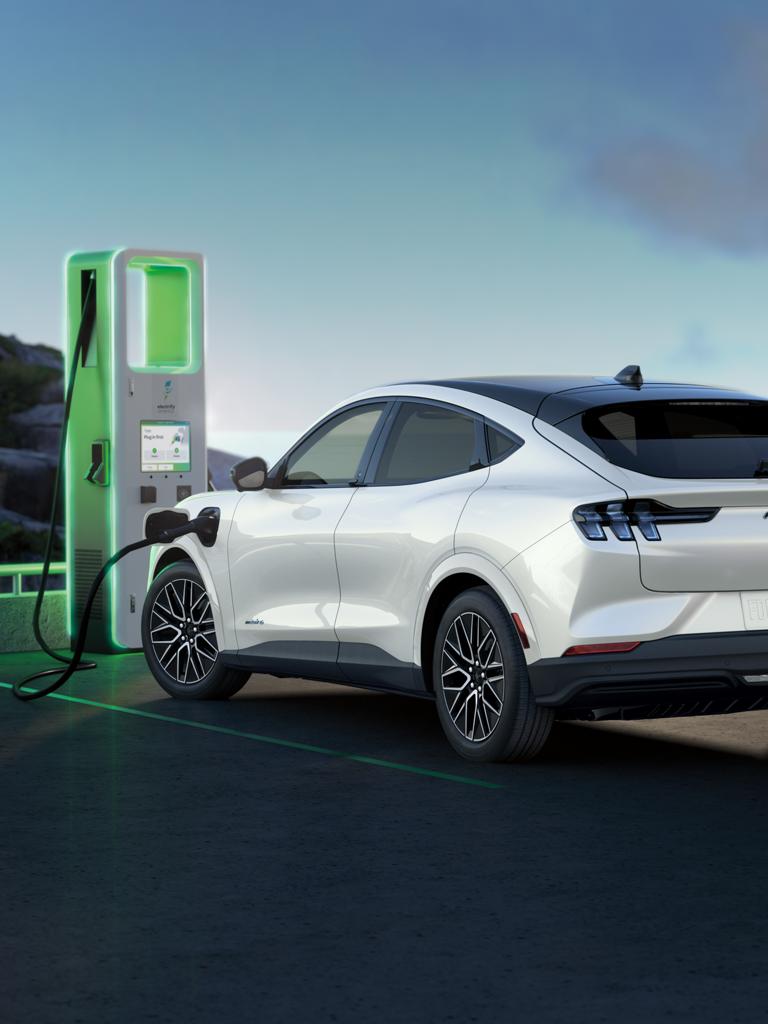 2026 Ford Mustang Mach-E® SUV parked at a public charging station