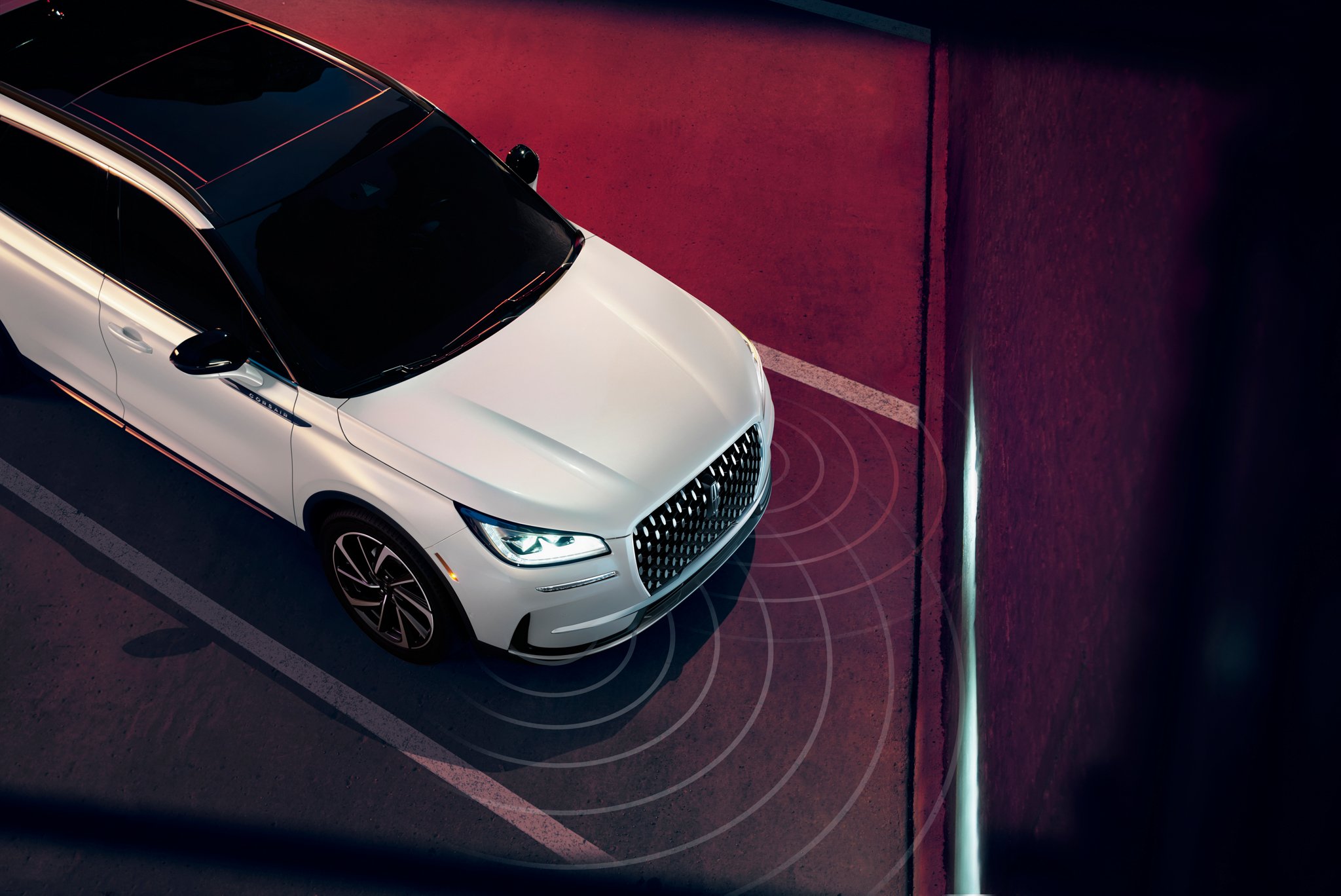 Simulated sensing waves emit from a 2025 Lincoln Corsair® SUV to demonstrate Pre-Collision Assist