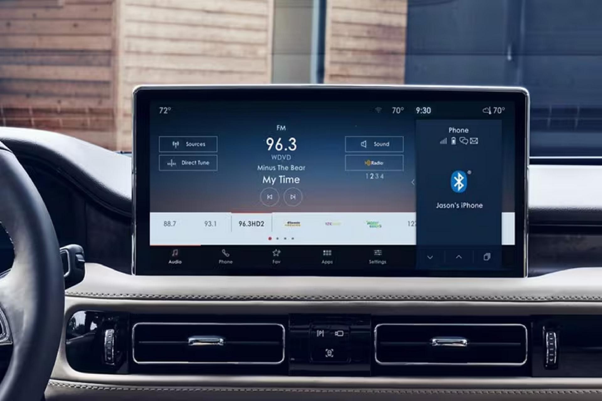 The interior of a Lincoln SUV showcases the touchscreen
