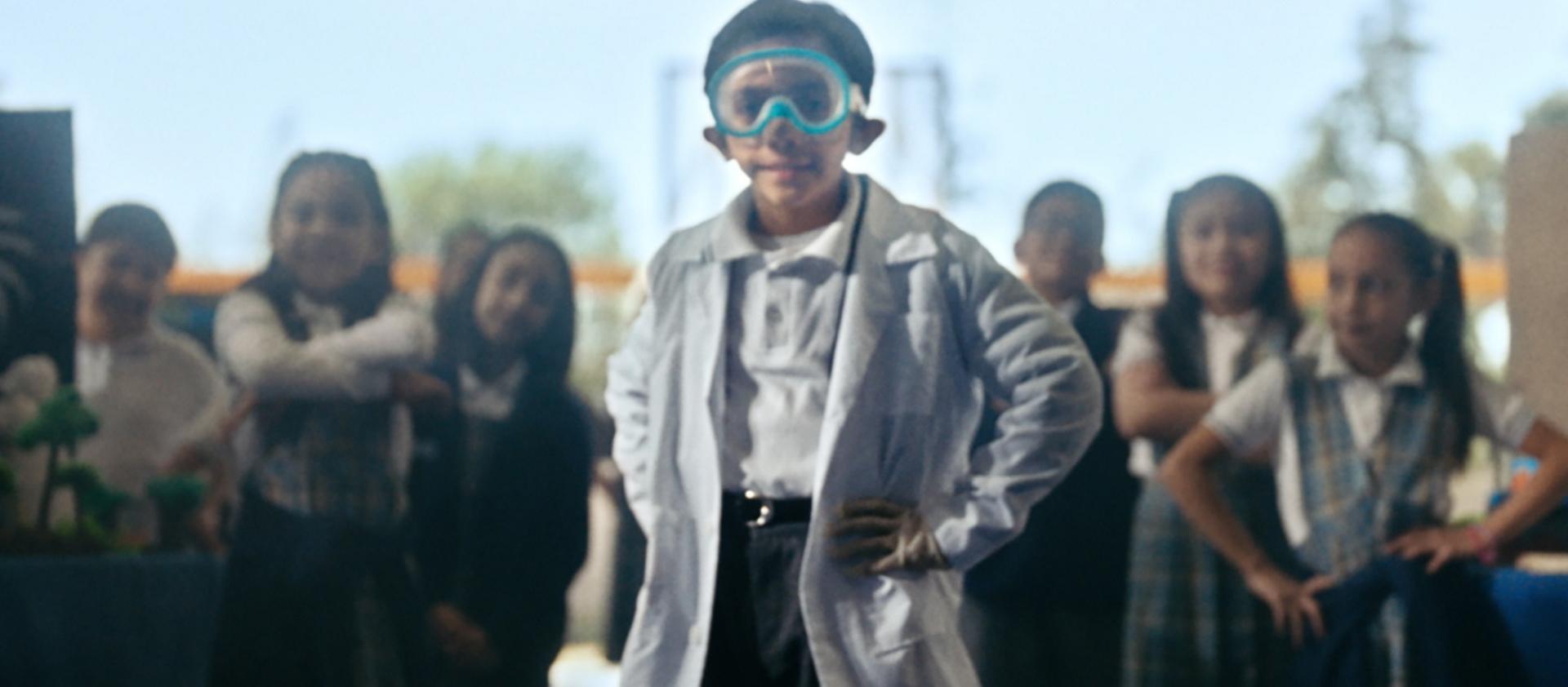 Group of smiling kids lined up at school