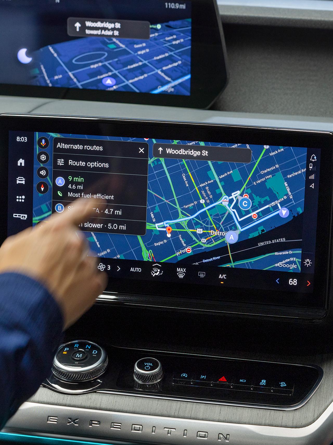 Driver using the 2027 Ford Expedition® center display