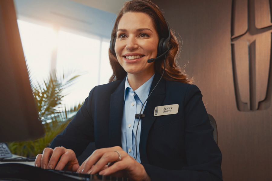 a Lincoln concierge responding to a telephone call is shown here