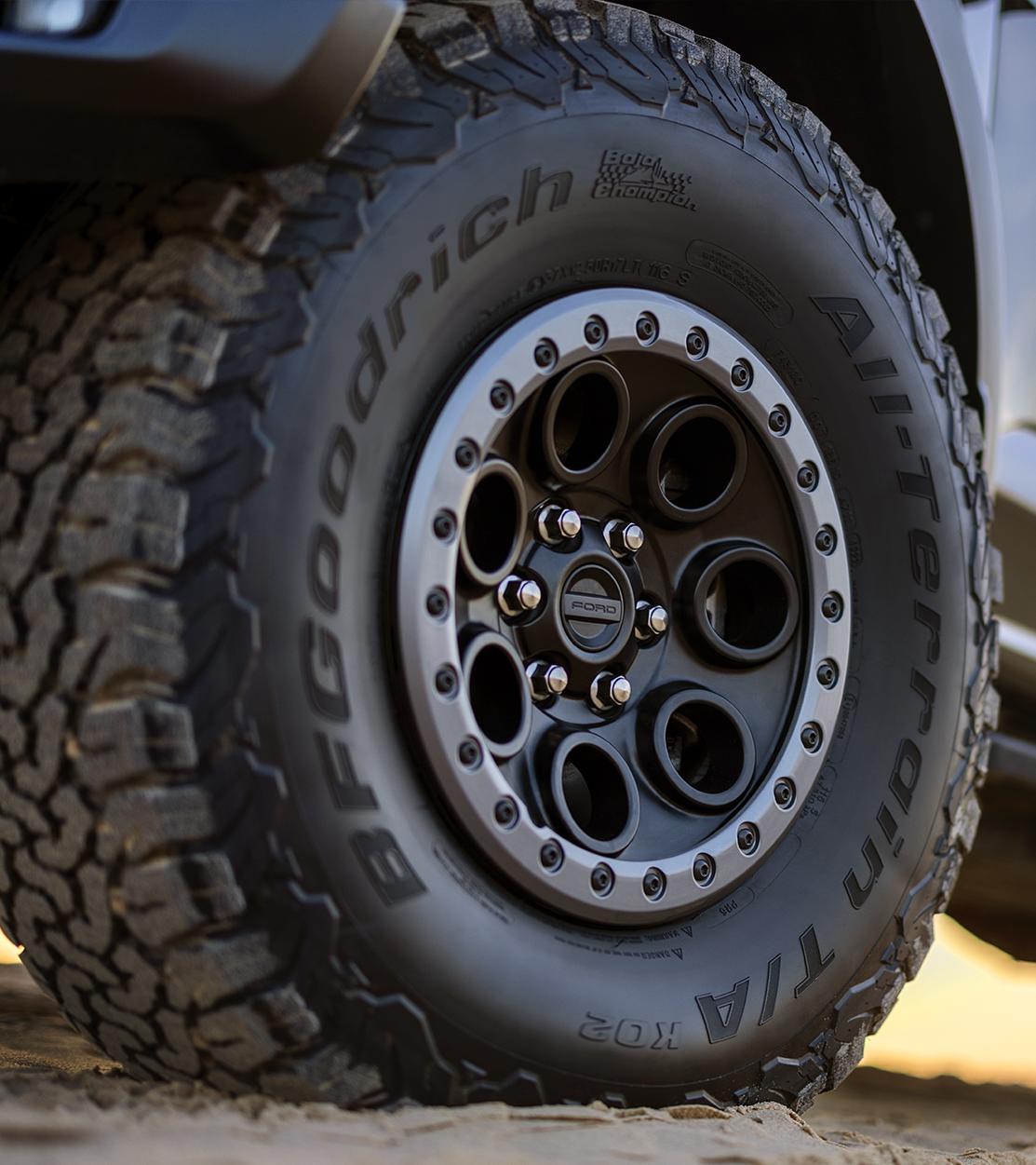 Close-up of the 37-inch wheel and all-terrain tires of a 2026 Ford F-150® Raptor® truck