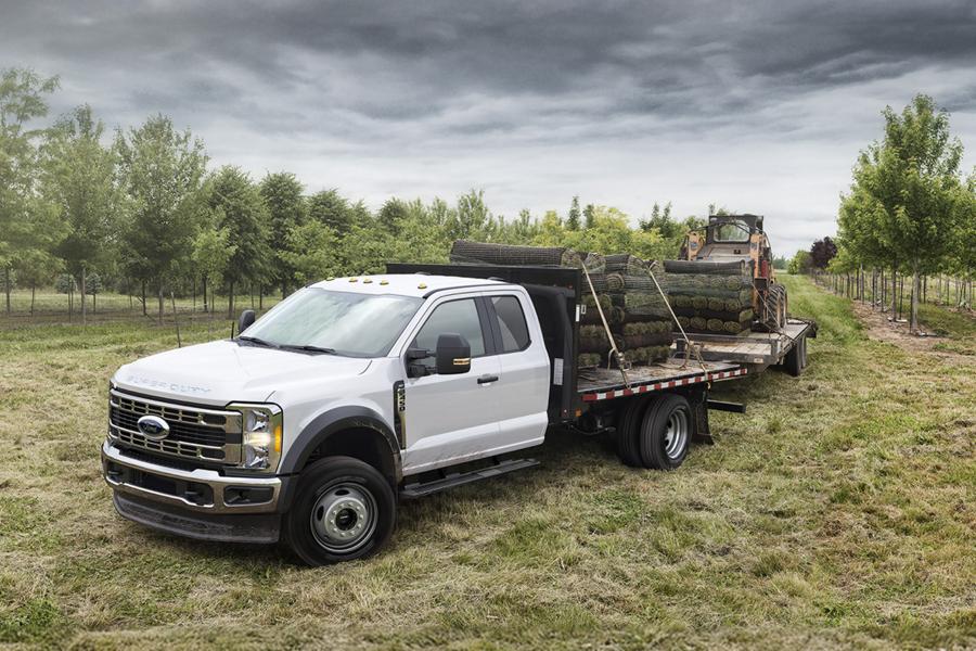 2026 Ford Super Duty® Chassis Cab in Oxford White hauling a load