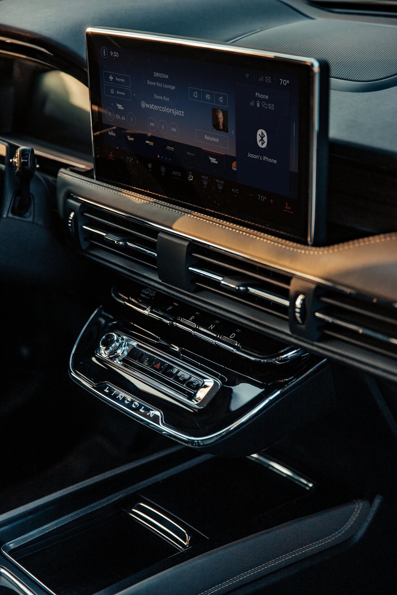 A Lincoln Corsair center-stack display is shown.