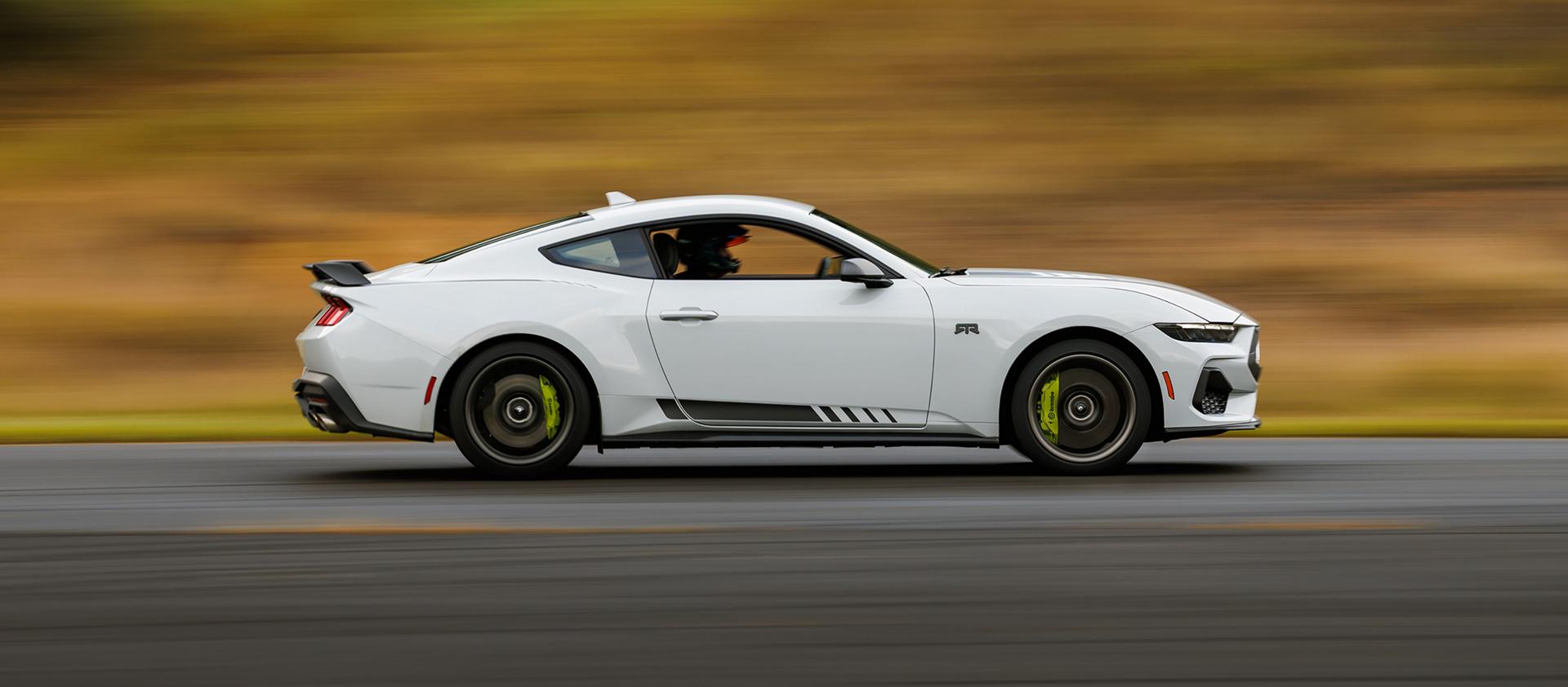 2026 Ford Mustang® EcoBoost® fastback with available Mustang® RTR® Package being driven on a closed course