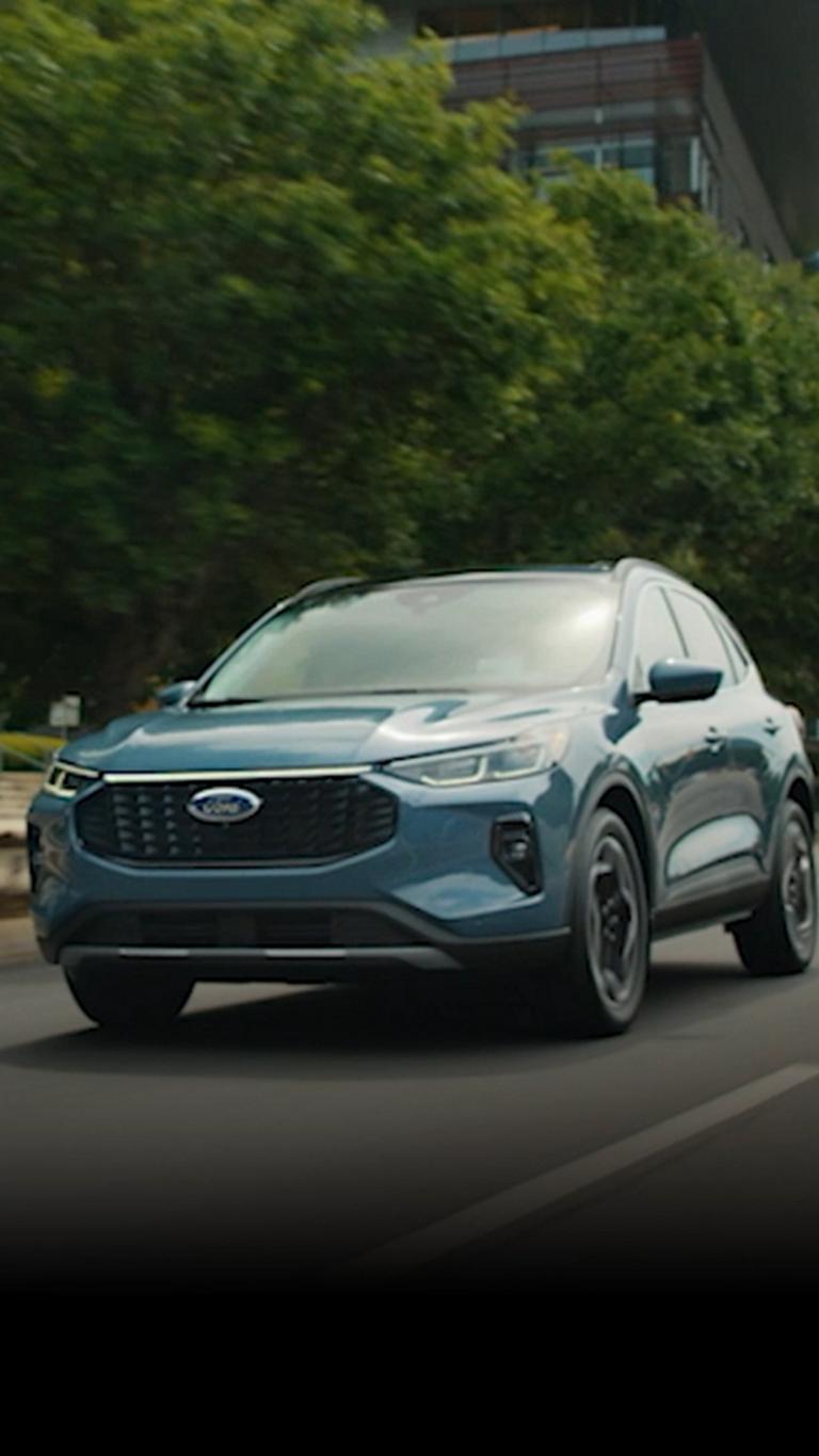 2026 Ford Escape® driving through a city