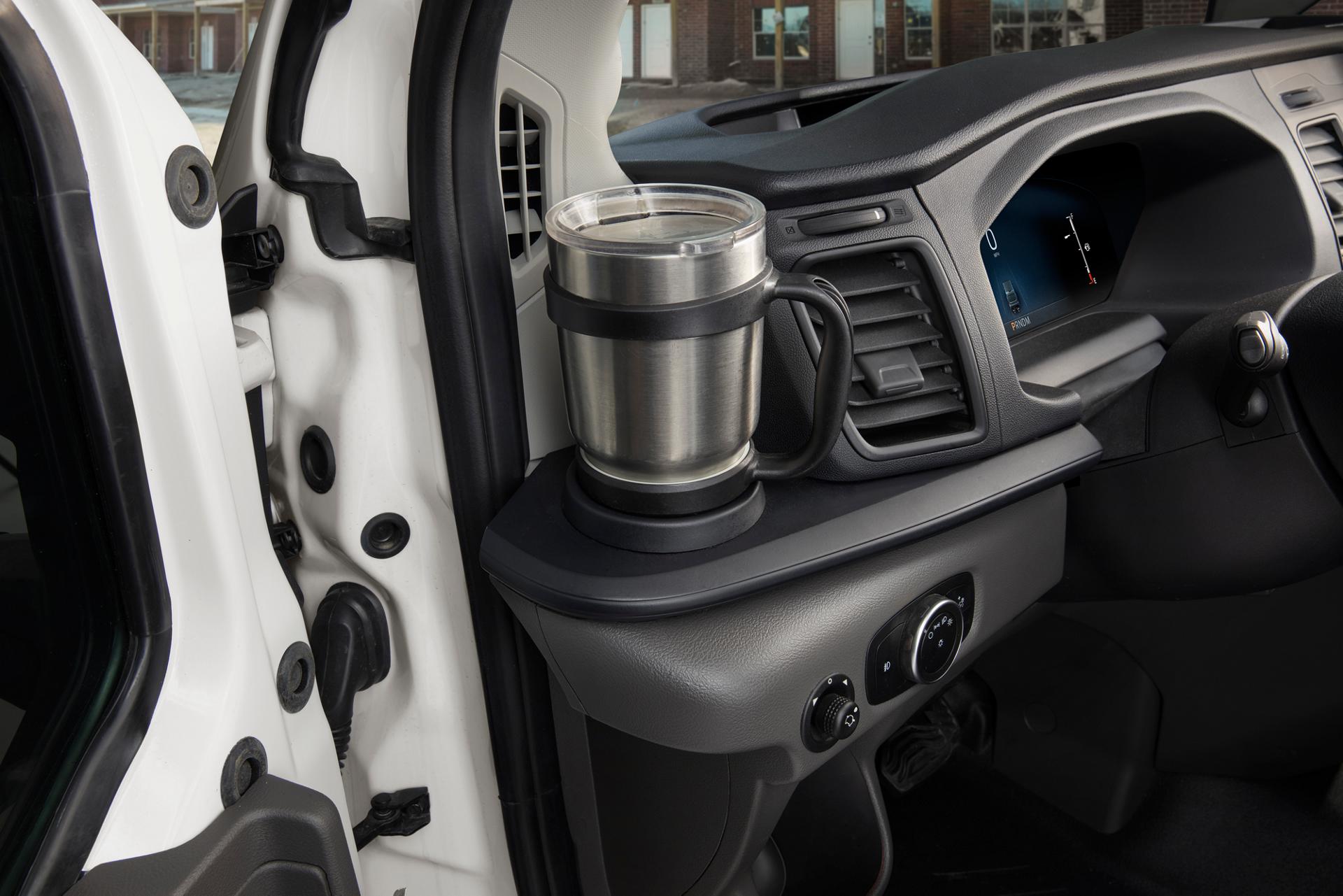 Cup holder inside a 2026 Ford Transit® van driver's side door