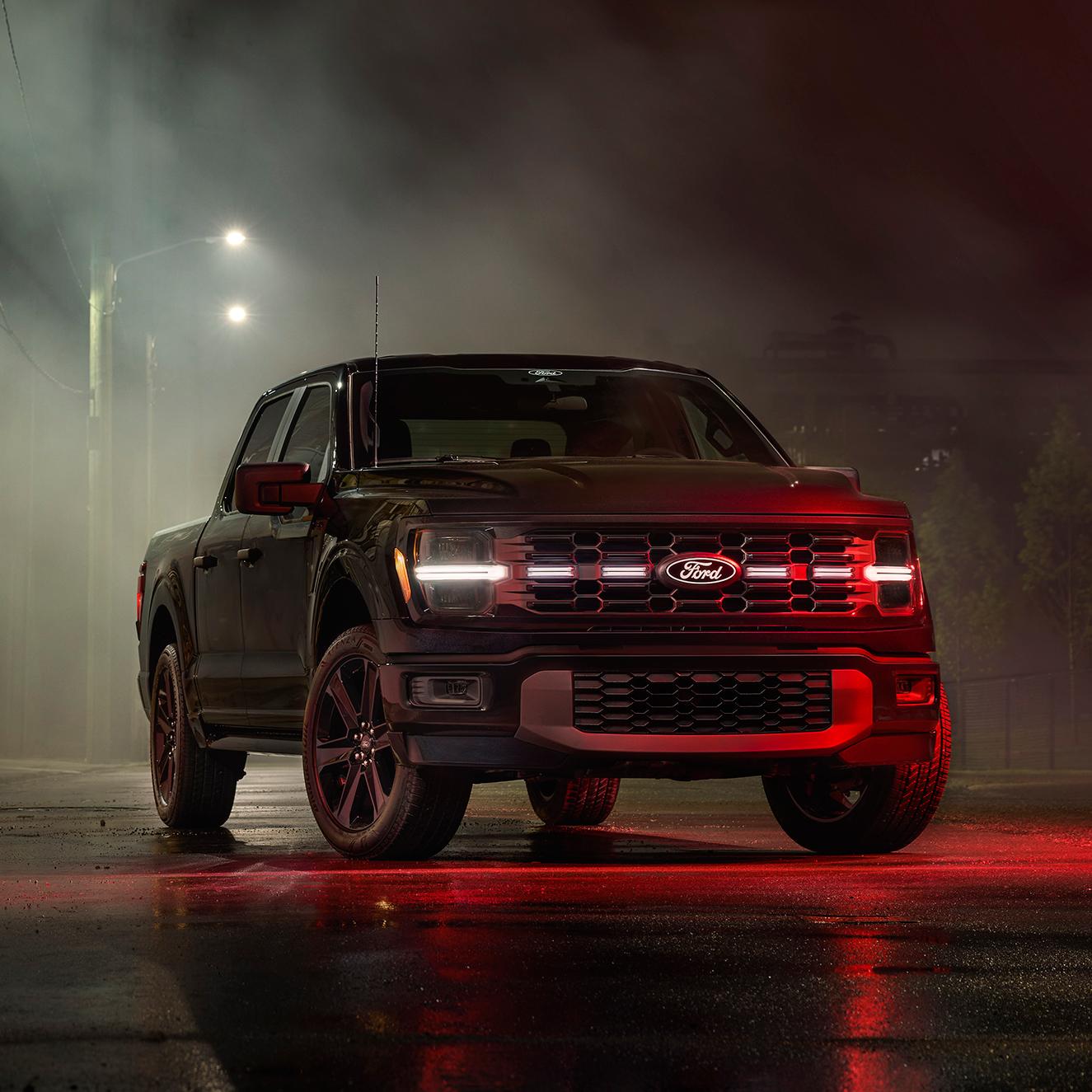 2026 Ford F-150® Lobo Package pickup parked under a street light at night