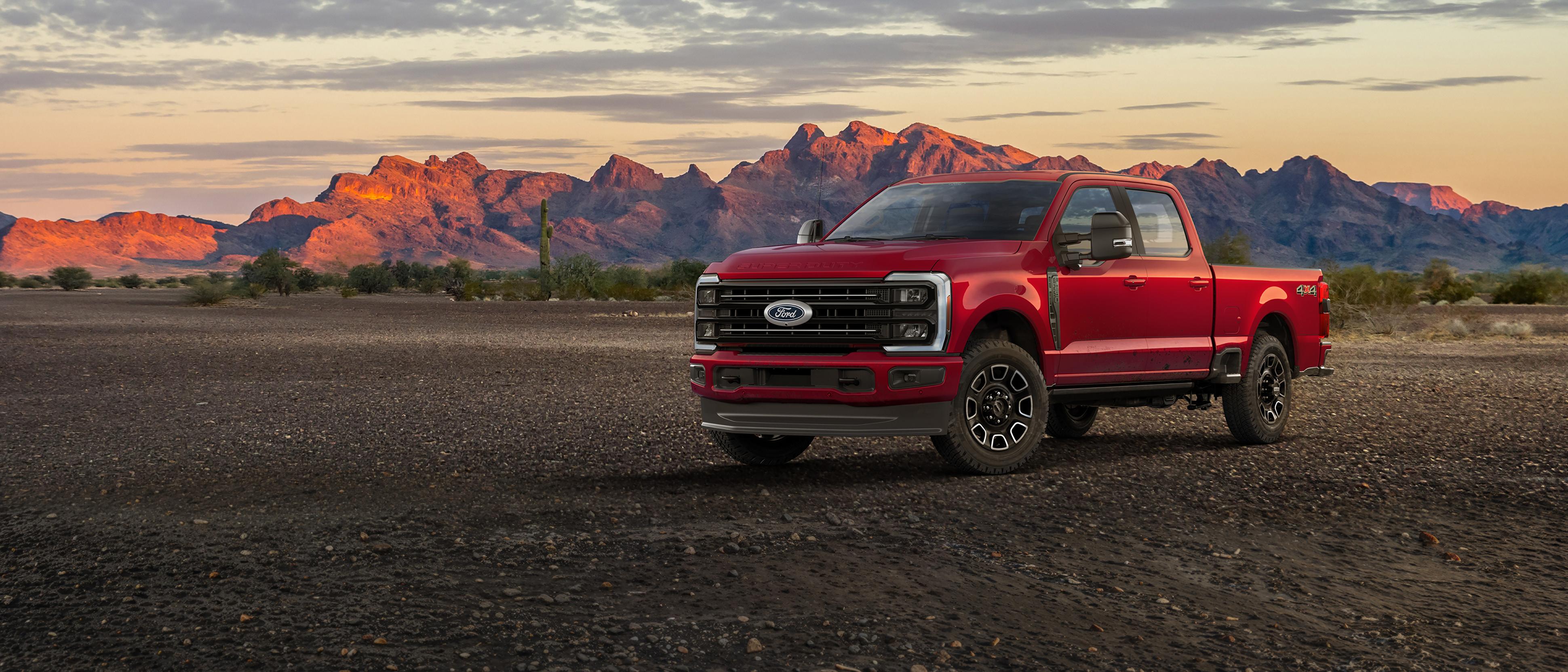 2027 Ford Super Duty® F-250® Platinum® truck parked on a dirt road in the mountains