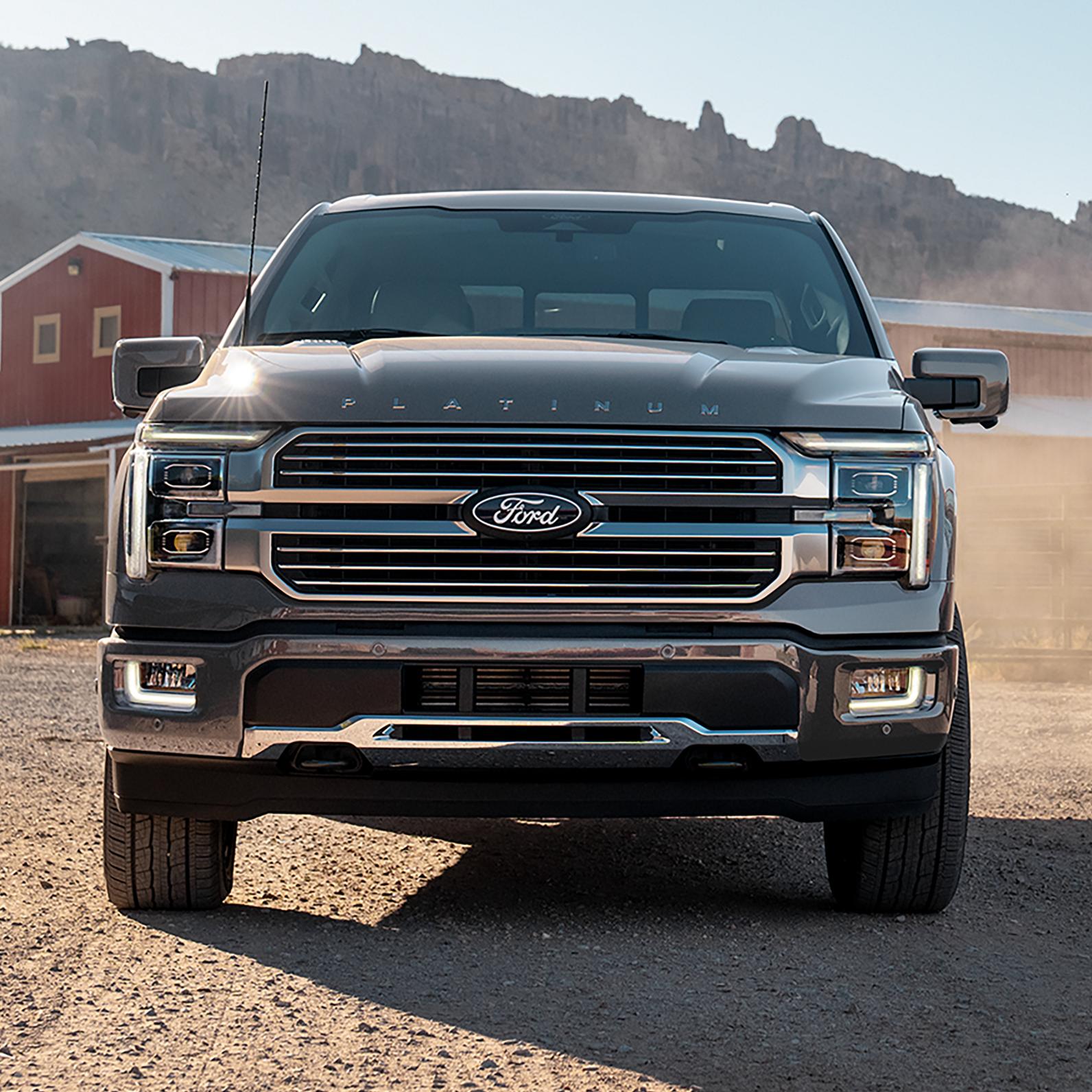 2025 Ford F-150® parked in front a barn and farm equipment