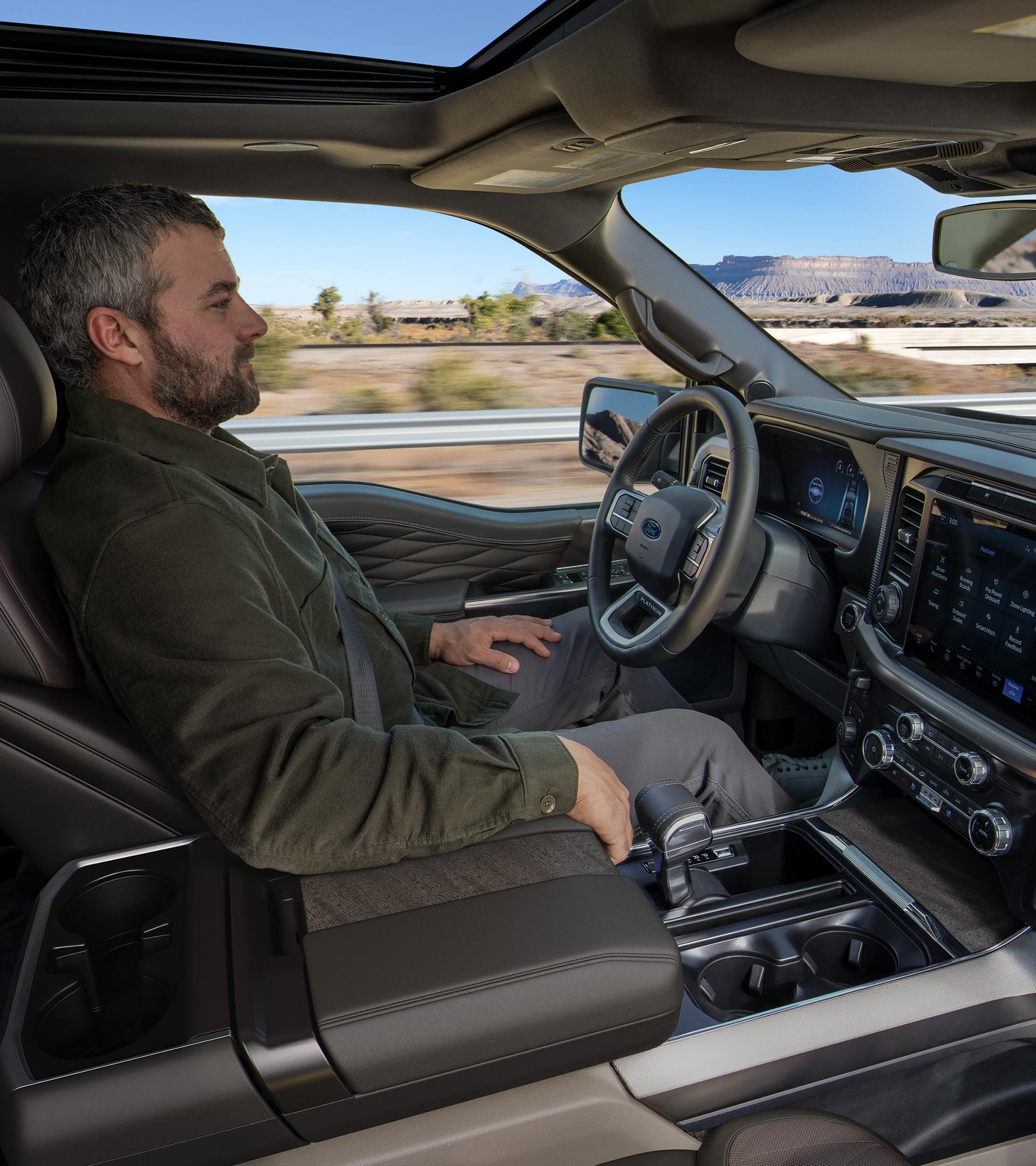 Man using the Ford BlueCruise hands-free driving feature on a 2025 Ford F-150® pickup