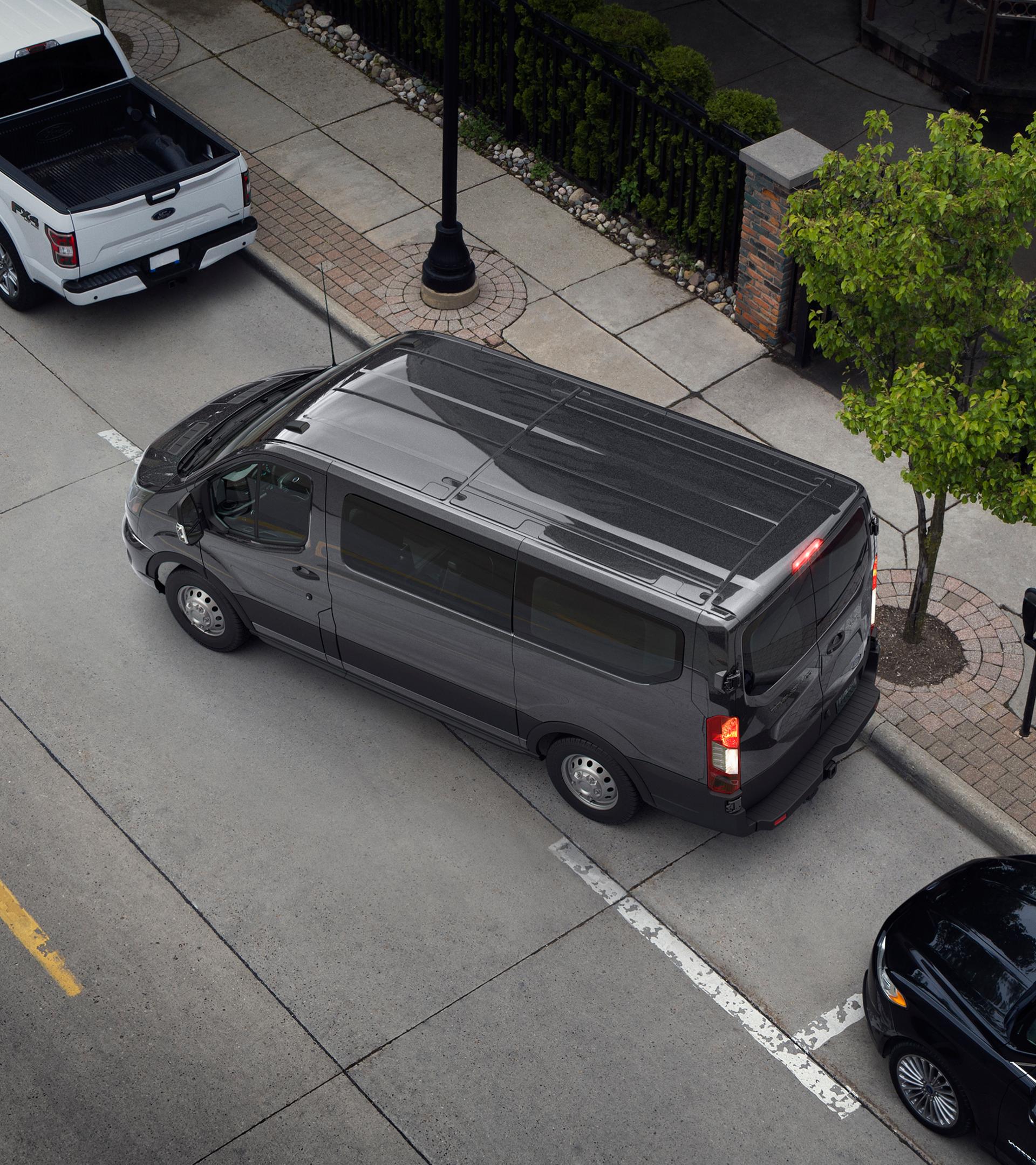 Bird's eye view on a 2026 Ford Transit® van parallel parking