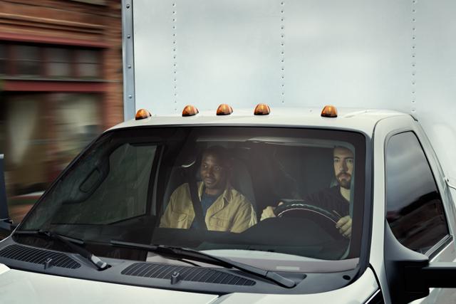 Driver and passenger seen through 2026 Ford F-750® windshield