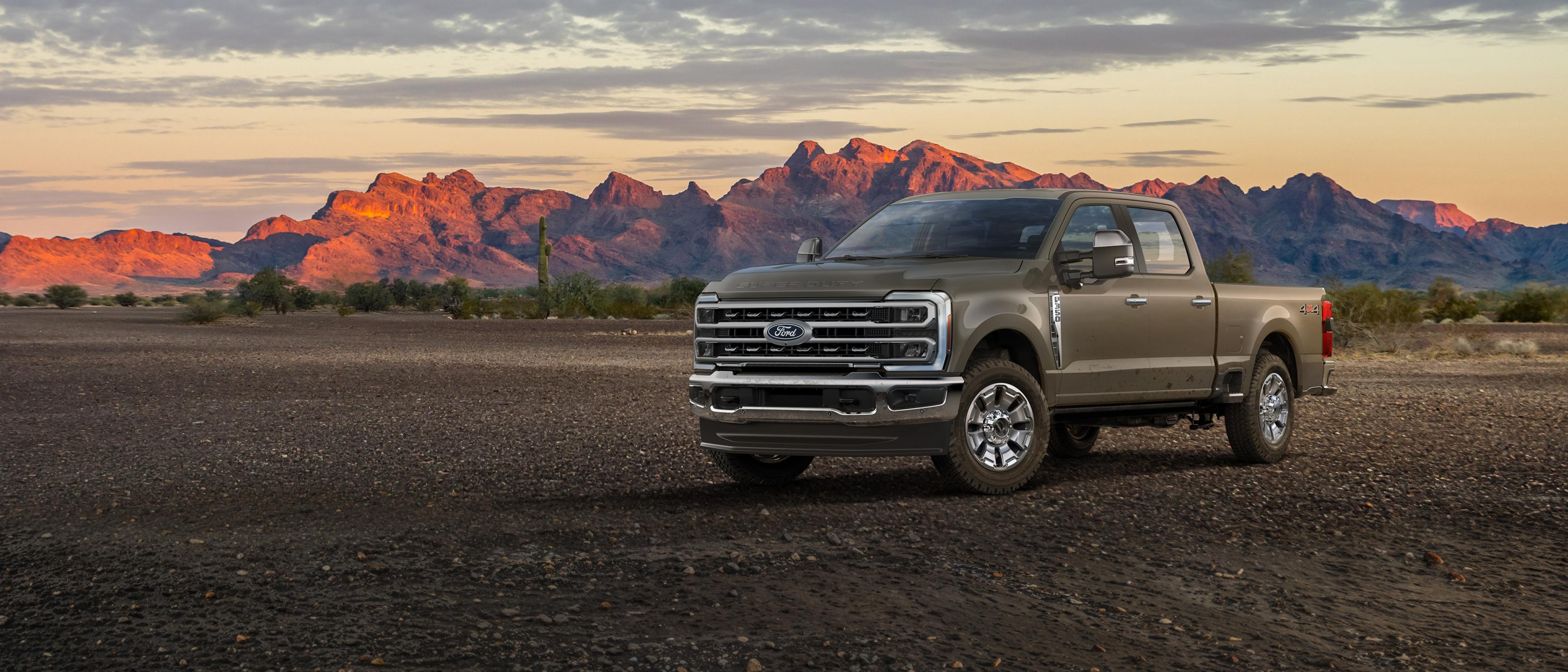 2027 Ford Super Duty® F-350® King Ranch® truck parked on a dirt road in the mountains