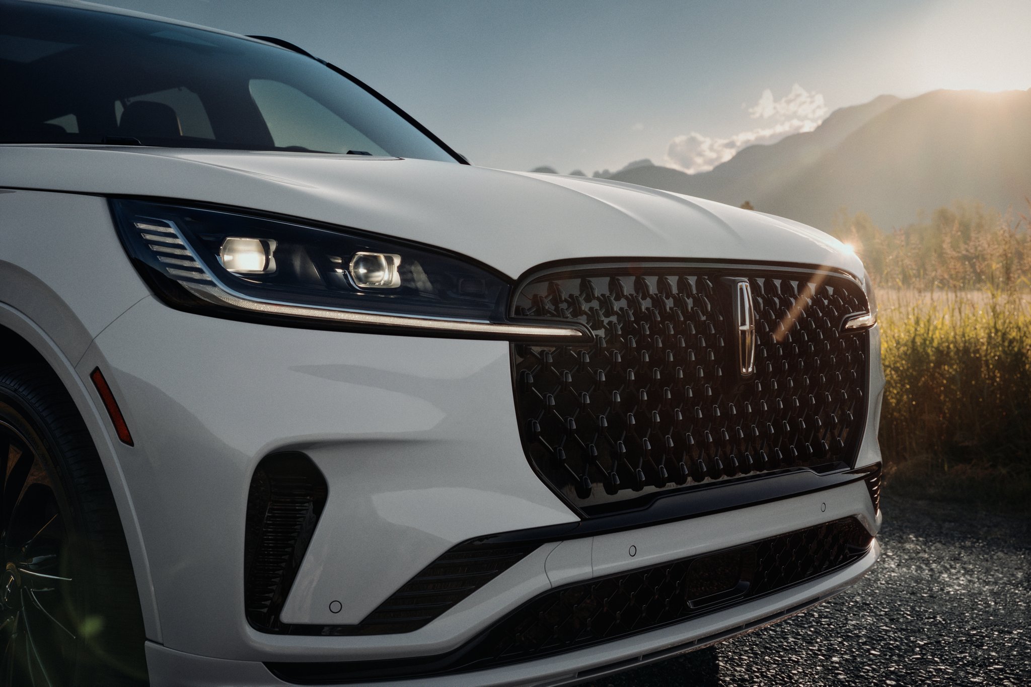 A close up shot of the Auto High-beam headlamp is shown on the 2025 Lincoln Aviator.