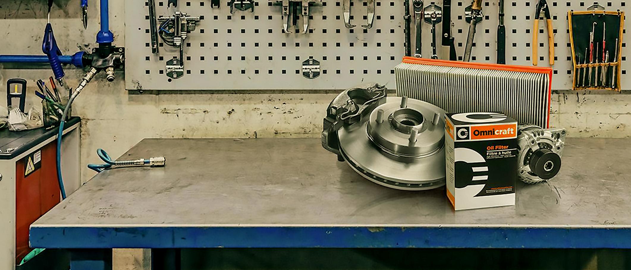 Ford parts laid out on a shop table