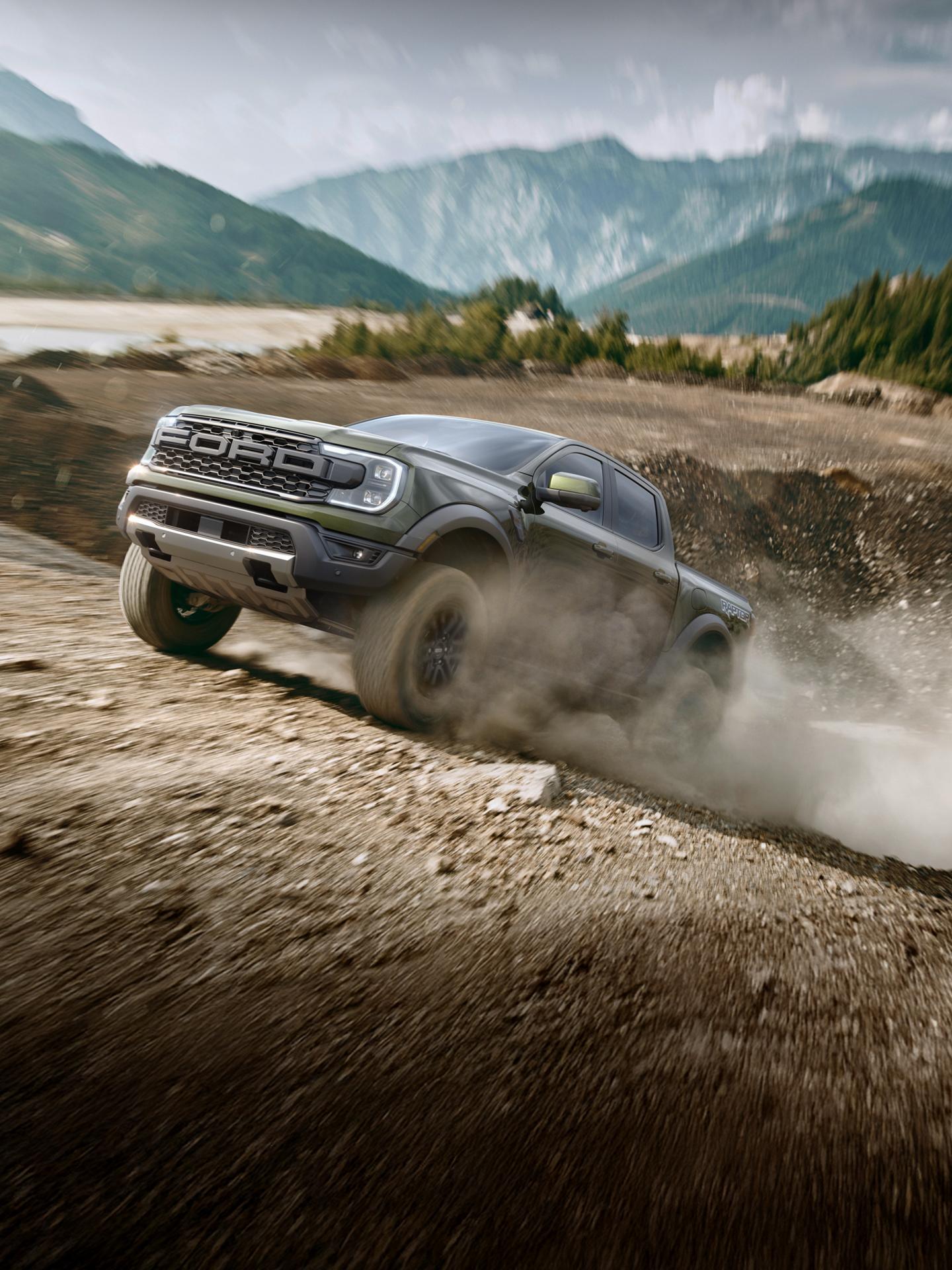 2026 Ford Ranger® Raptor® driving over rough terrain at high speeds in a mountainous desert